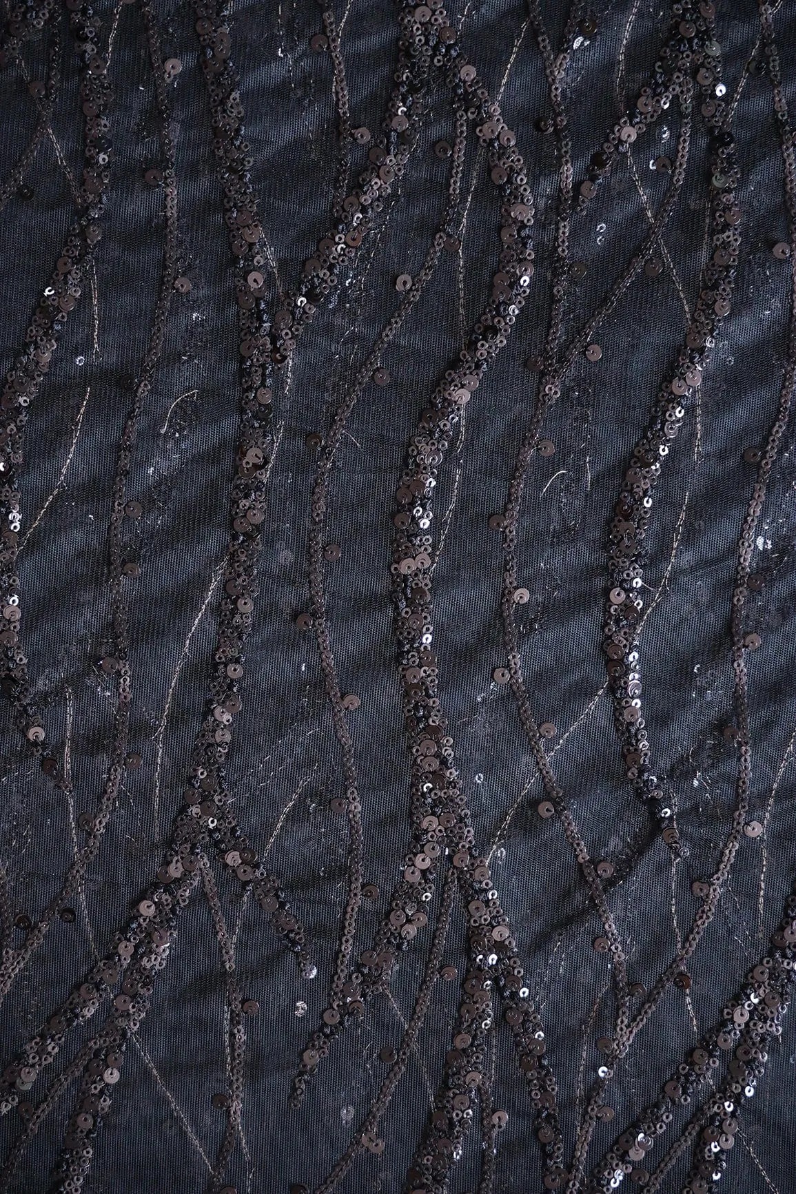 Beautiful Sequins With Black Thread Wavy Embroidery Work On Black Soft Net Fabric