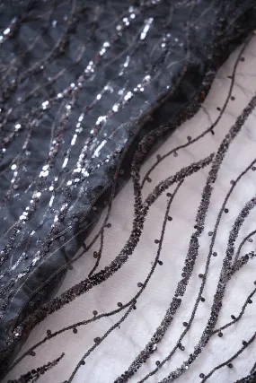 Beautiful Sequins With Black Thread Wavy Embroidery Work On Black Soft Net Fabric