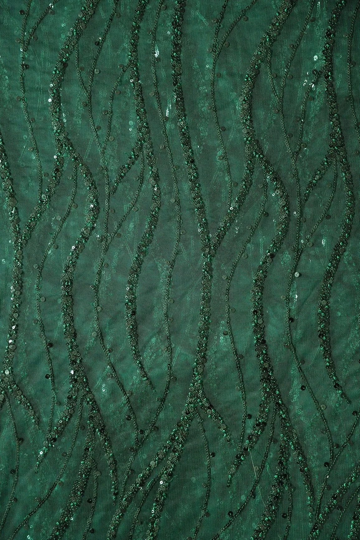 Beautiful Sequins With Green Thread Wavy Embroidery Work On Bottle Green Soft Net Fabric