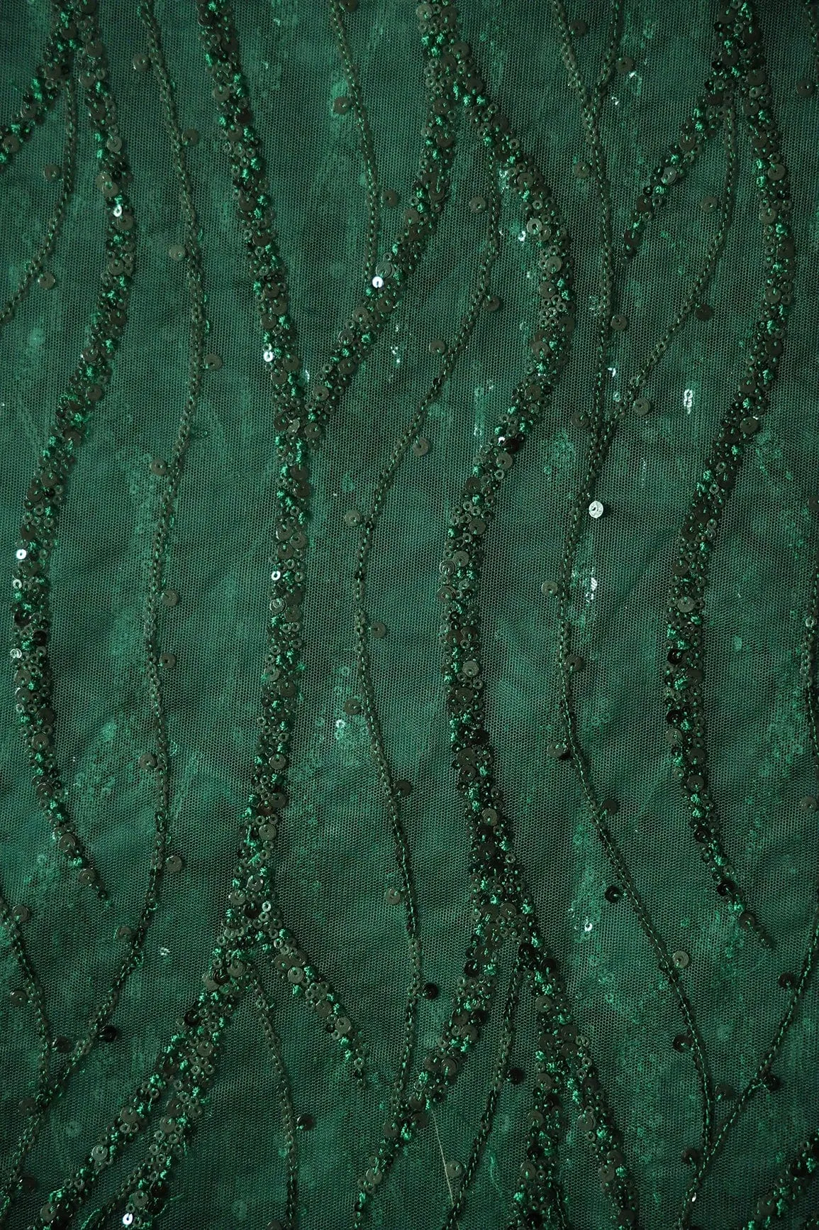 Beautiful Sequins With Green Thread Wavy Embroidery Work On Bottle Green Soft Net Fabric