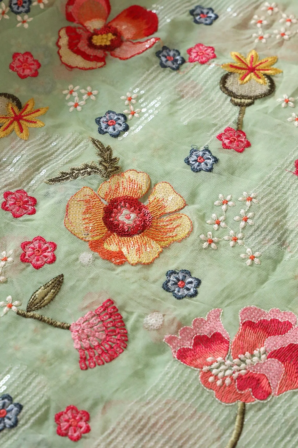 Beautiful Water Sequins With Multi Color Floral Embroidery On Olive Viscose Georgette Fabric