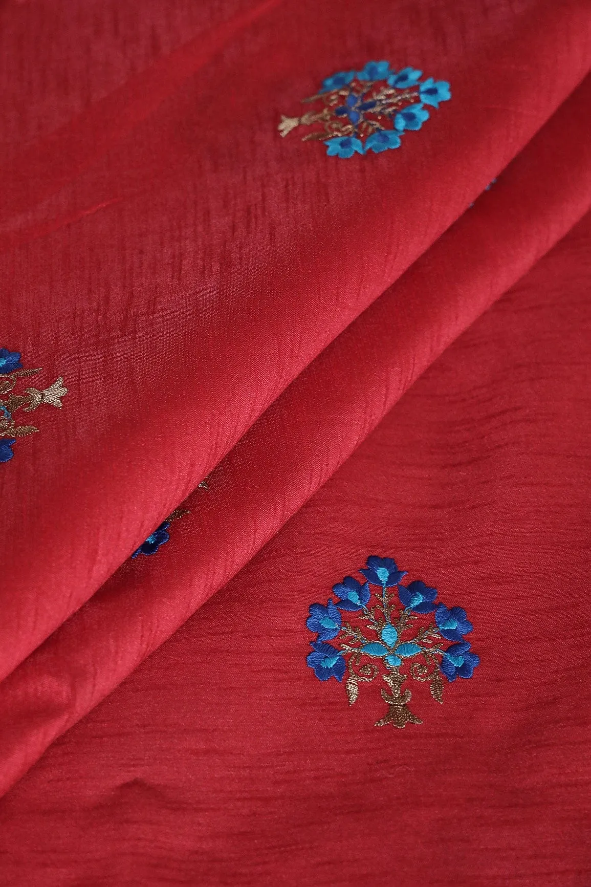 Blue Thread With Gold Zari Small Floral Embroidery Work On Red Banglori Satin Fabric