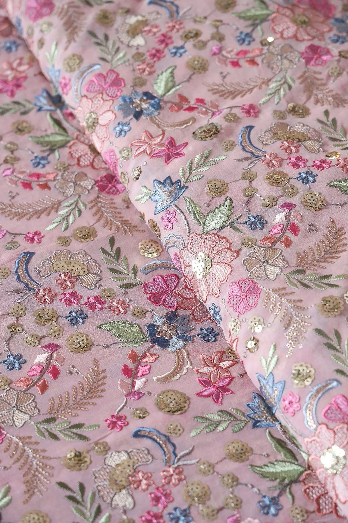 Delightful Pastel Thread With Gold Sequins Heavy Floral Embroidery On Mauve Viscose Georgette Fabric