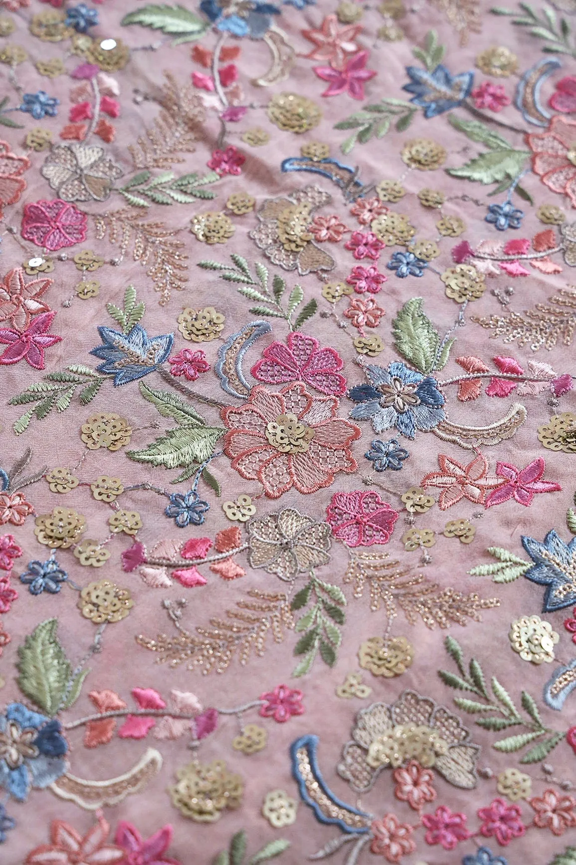 Delightful Pastel Thread With Gold Sequins Heavy Floral Embroidery On Mauve Viscose Georgette Fabric