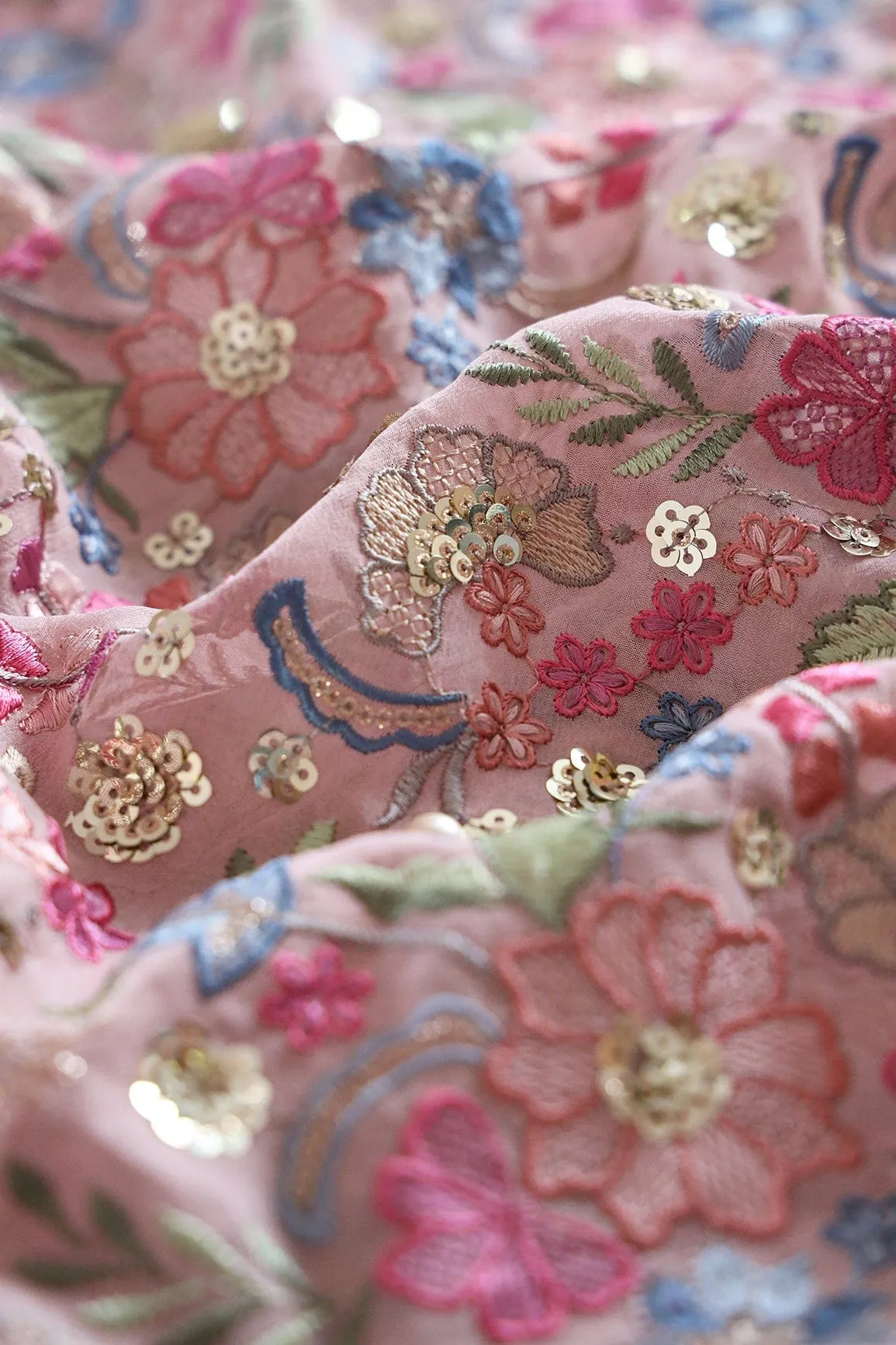 Delightful Pastel Thread With Gold Sequins Heavy Floral Embroidery On Mauve Viscose Georgette Fabric