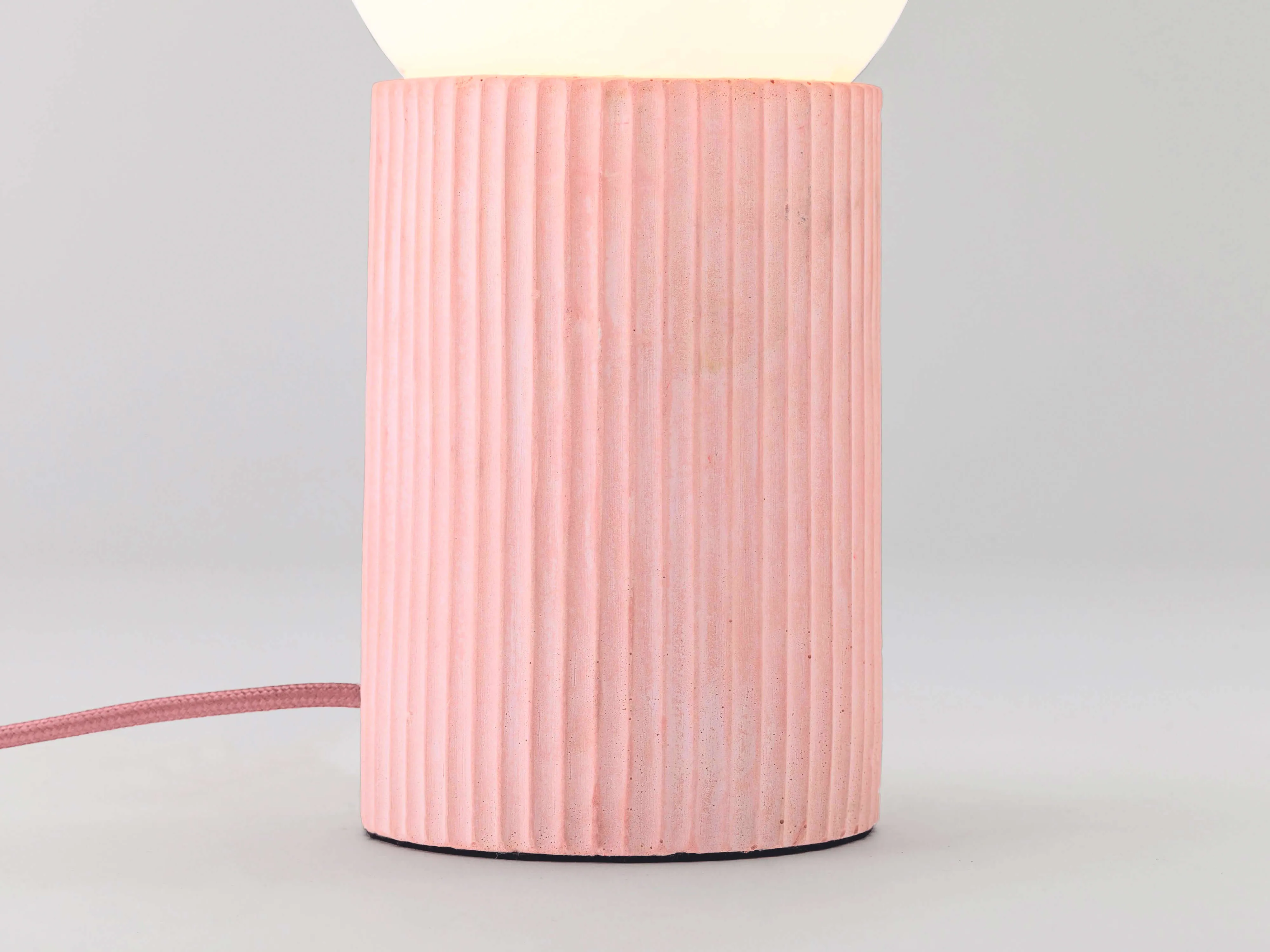 Pink concrete ribbed table lamp