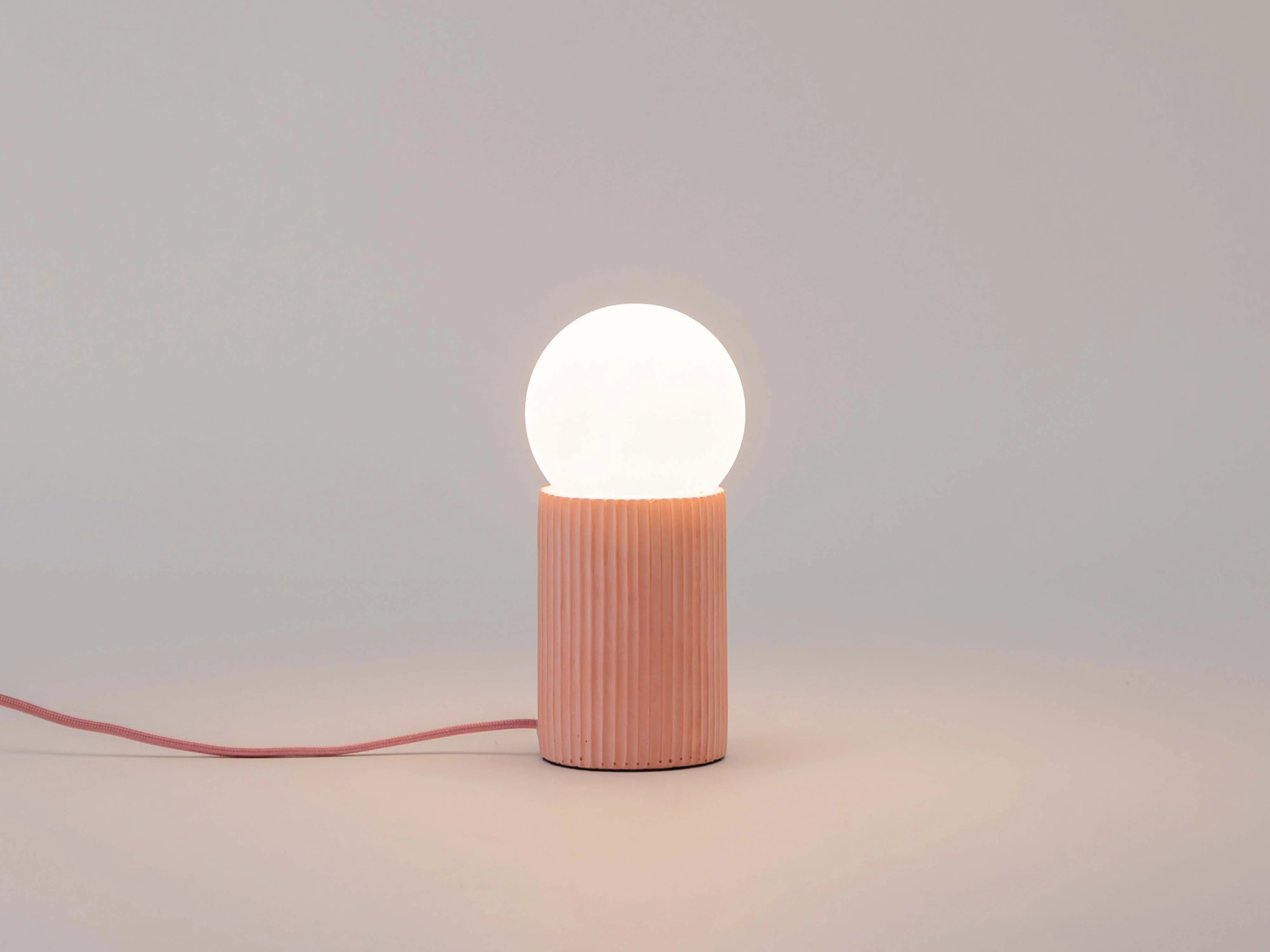 Pink concrete ribbed table lamp