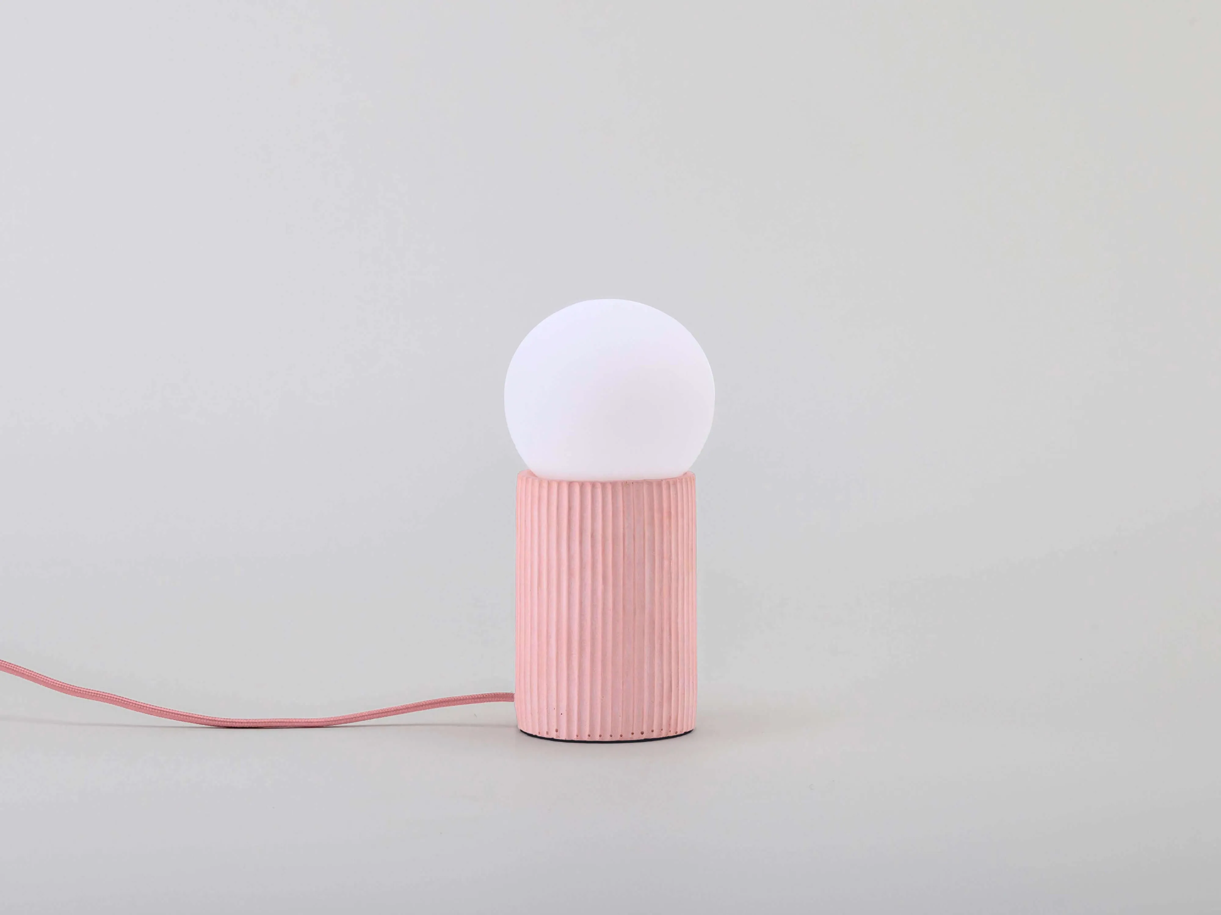 Pink concrete ribbed table lamp